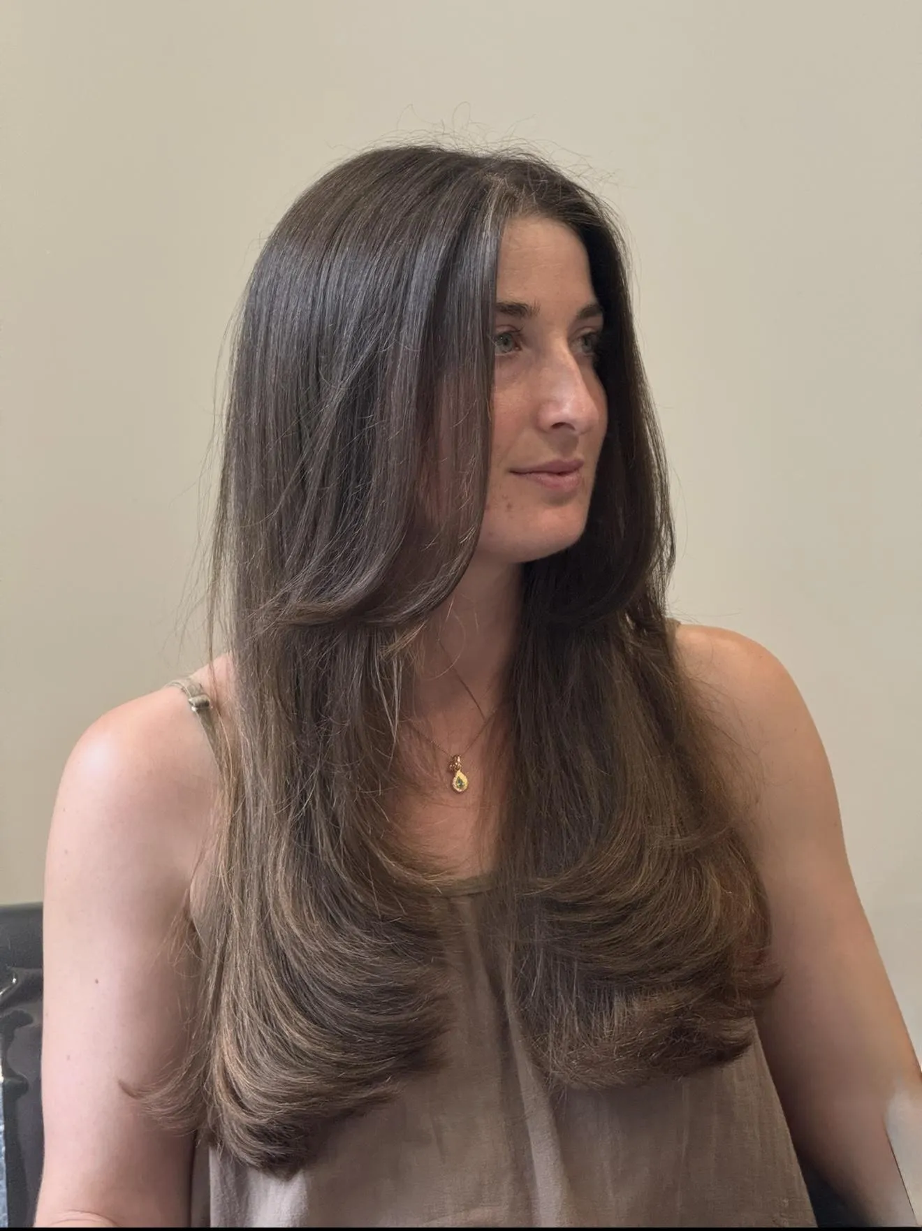 Precision haircut being styled in a professional salon