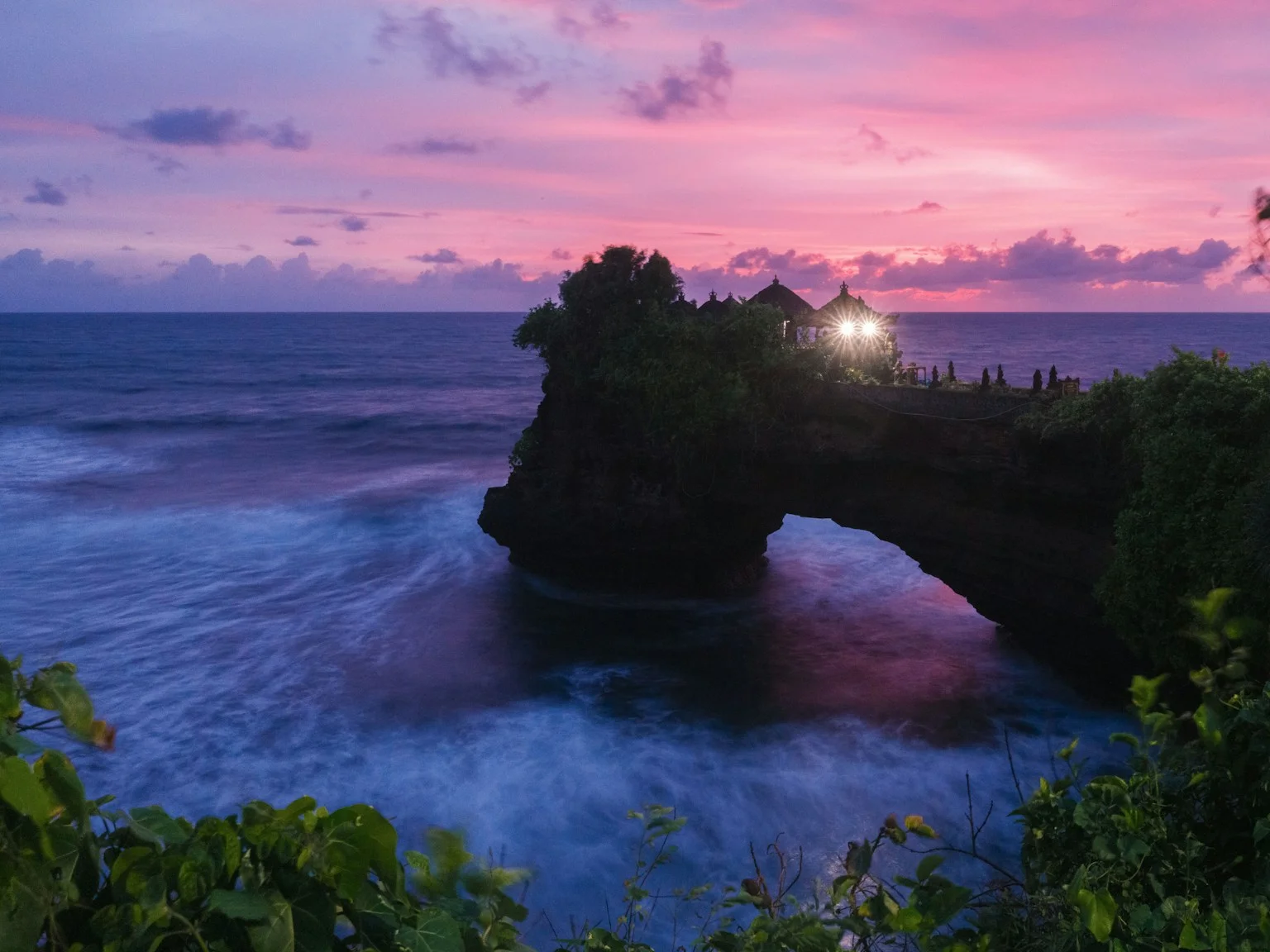 Sunset light reflecting on calm ocean water